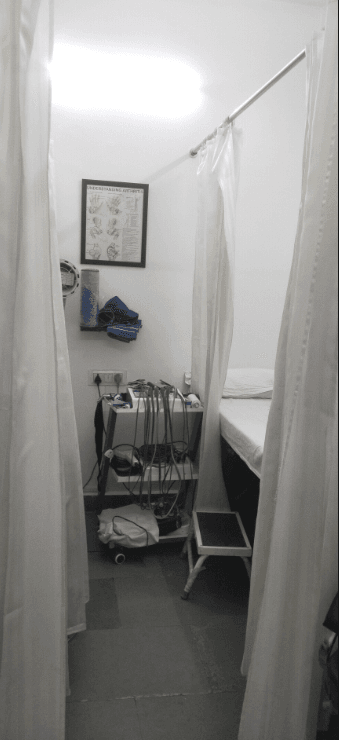 Private treatment cubicle with physiotherapy equipment